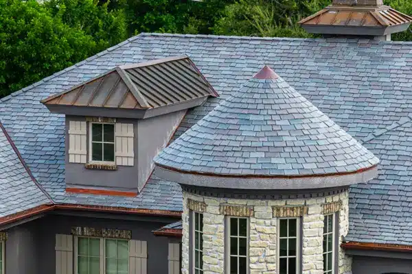 The colors in the European blend complement the home, while the low-maintenance composite slate will protect the dwelling in Florida storms. 