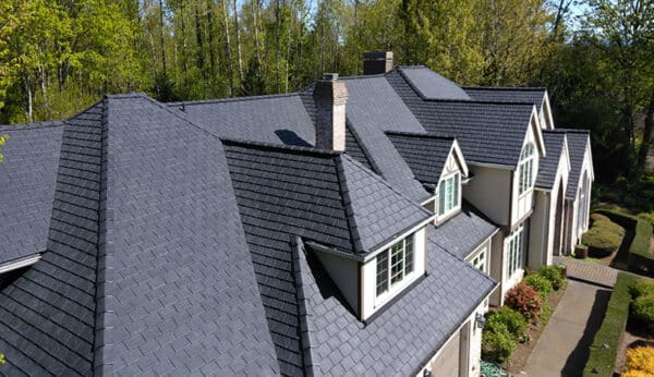 With longevity advantages over cedar shake and undeniable curb appeal it's no surprise that more and more the Pacific Northwest embraces synthetic slate.