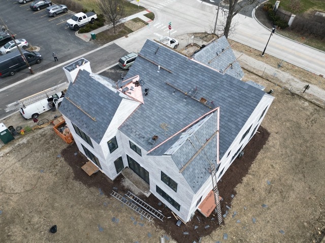 After doing her research, designer Amy Storm chose to add snow guards to her new composite roof.